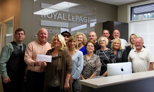 SAFE Society accepts cheque from Royal LePage Access agents and staff